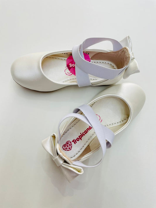 Zapato con resorte y moño